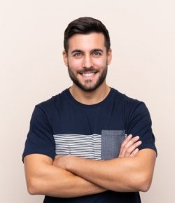 young-handsome-man-with-beard-isolated-keeping-arms-crossed-frontal-position_1368-132662